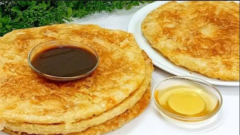 فطار الأبطال.. طريقة عمل الفطير المشلتت وتقديمه مع أطباق حلوة وحادقة
