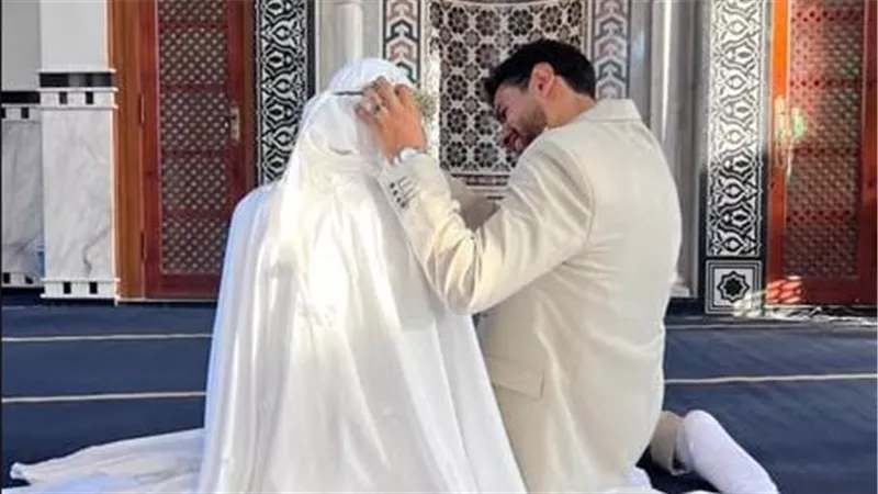بعد جلسة تصوير عروسين بأحد المساجد.. د نيڤين مختار: لاحرج في ذلك |خاص