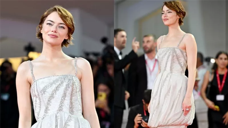 إيما ستون ترتدي إطلالة مستوحاة من الألفينات خلال حضورها فينيسيا السينمائي 