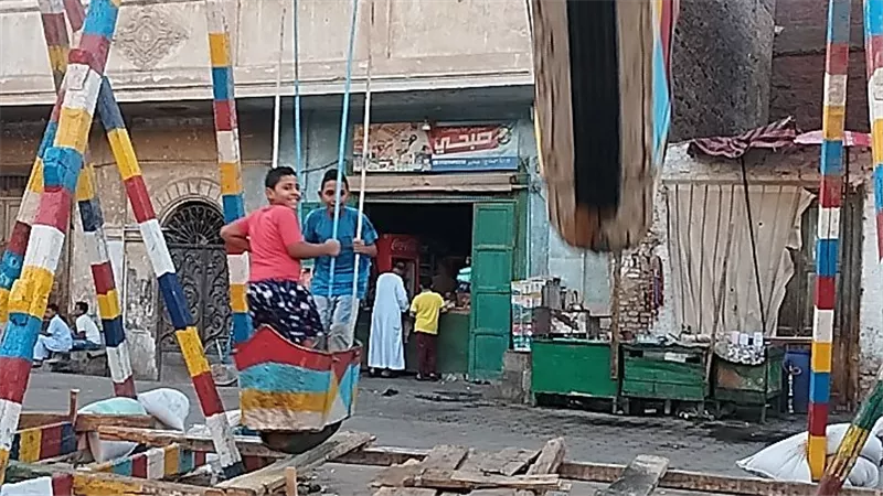 نكهات تقليدية وأجواء شعبية.. كيف يحتفل أهالي دشنا بالمولد النبوي؟ 