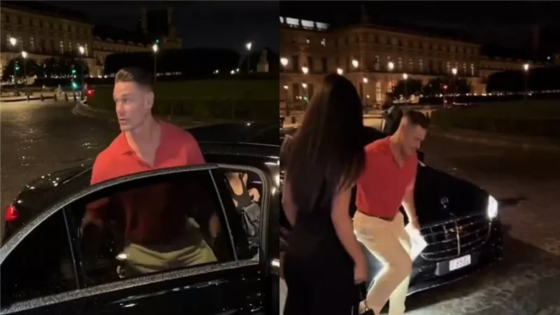 المصارع العالمي جون سينا يحمل زوجته لكي لا تلمس الماء بحذائها