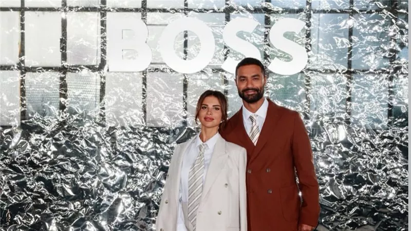 كريم فهمي وزوجته أبرز الحضور في عرض أزياء Boss بأسبوع ميلانو للموضة 