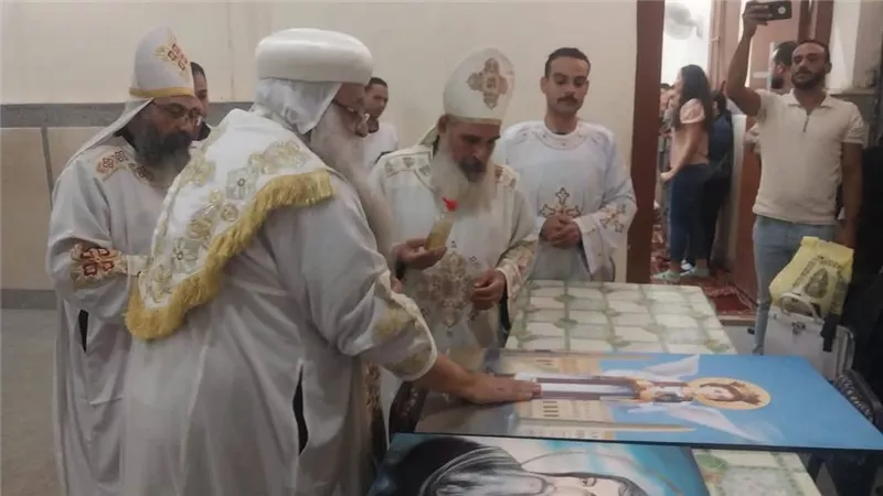 مطران دشنا يترأس القداس الإلهي رئيس الملائكة الجليل ميخائيل بقنا (صور)