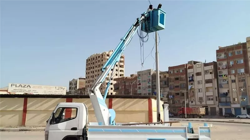 تكثيف أعمال صيانة وتأمين الأعمدة الكهربائية بحي فيصل والاستعداد للانتخابات
