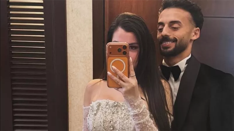 اللاعب أحمد عبدالقادر يرتدي بدلة بتوقيع إسلام سعد في حفل زفافه