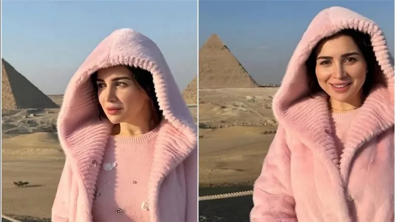 مي عز الدين بإطلالة ناعمة من اللون الزهري أمام الأهرامات