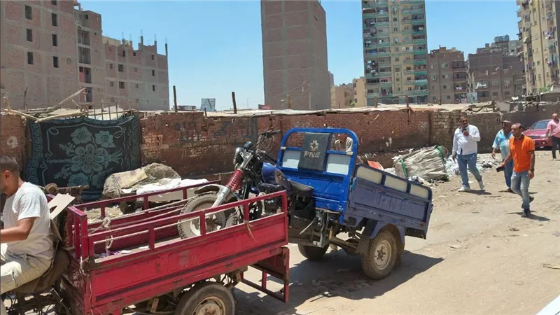 غلق مخازن الفرز بشارع الدكتور فؤاد سعيد والتحفظ على 8 مركبات مستخدمة بالجيزة 