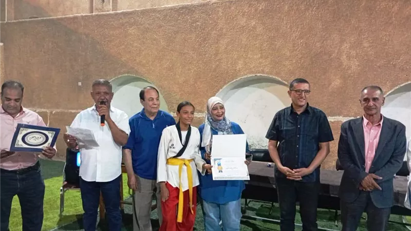 نادى النصر الرياضى باسوان يحتفى بأبطاله المتوجين فى بطولتى الكونغفو 