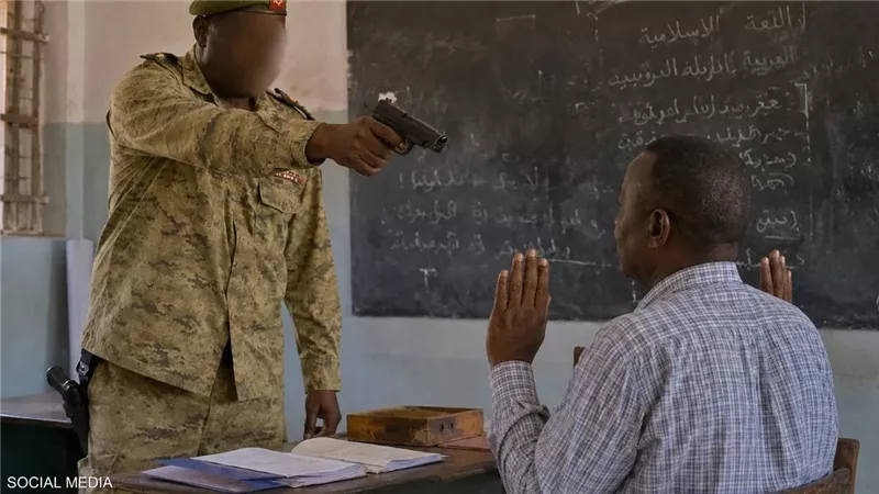 ضابط سوداني متقاعد يشهر سلاحه ويصفع معلما داخل مدرسة بمدينة أم درمان