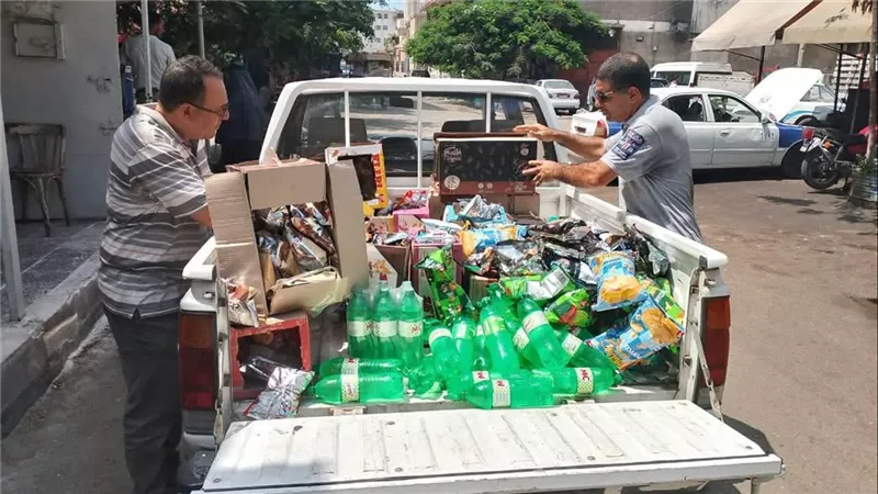 ضبط 200 عبوة عصير مجهولة ومياه غازيةومقرمشات منتهية الصلاحية ببورسعيد