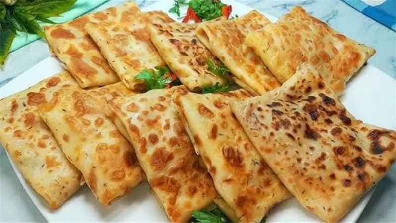 من غير فرن.. طريقة عمل فطيرة الطاسة بالخضروات في دقائق